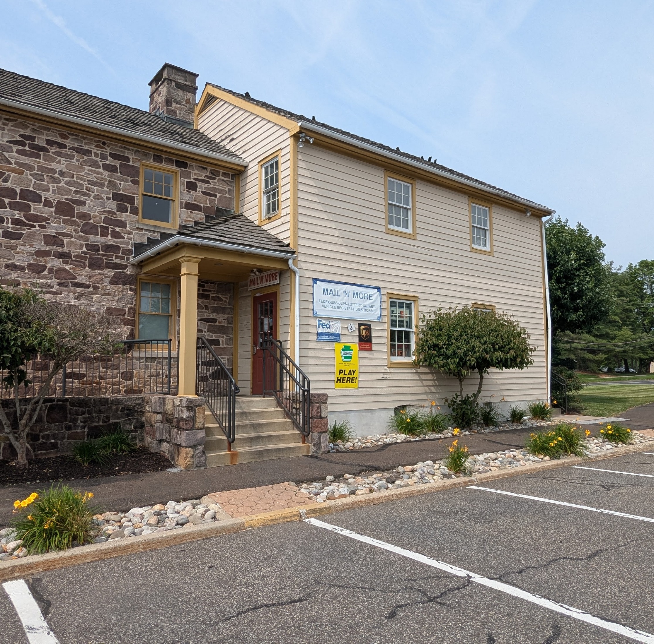 A photo showing the outside of the mail'n'more building